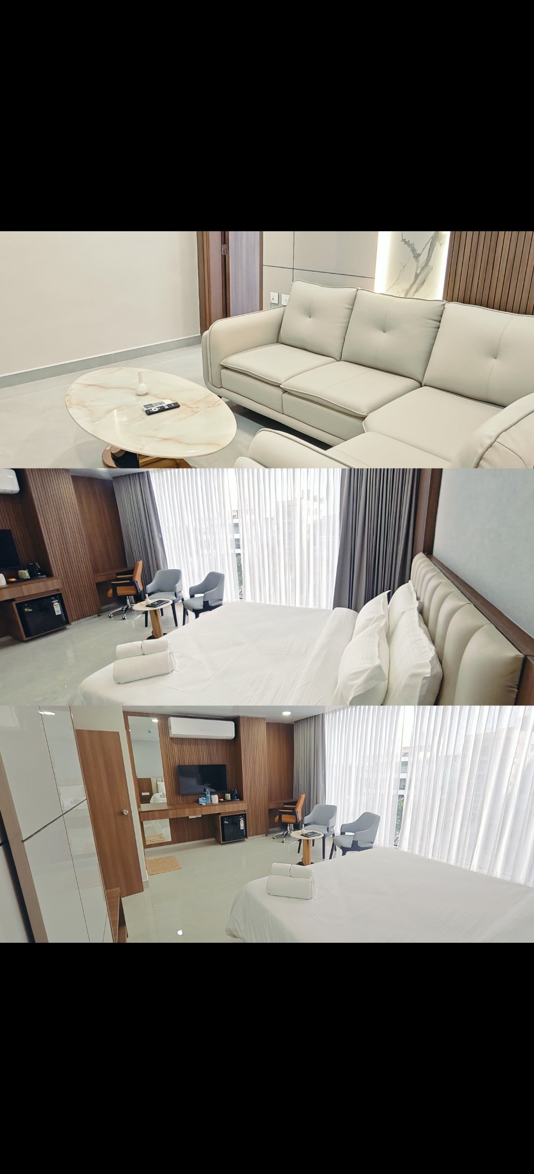Suite room interior showing a luxurious spacious bedroom with premium furniture, elegant decor, and superior amenities